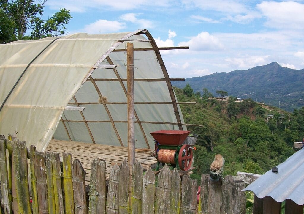 mountain view with a covered table and grinder in the foreground