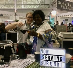 Atlas-trader Susan and Angele from Kalico Cooperative in Burundi sharing a cup of Burundi coffee.