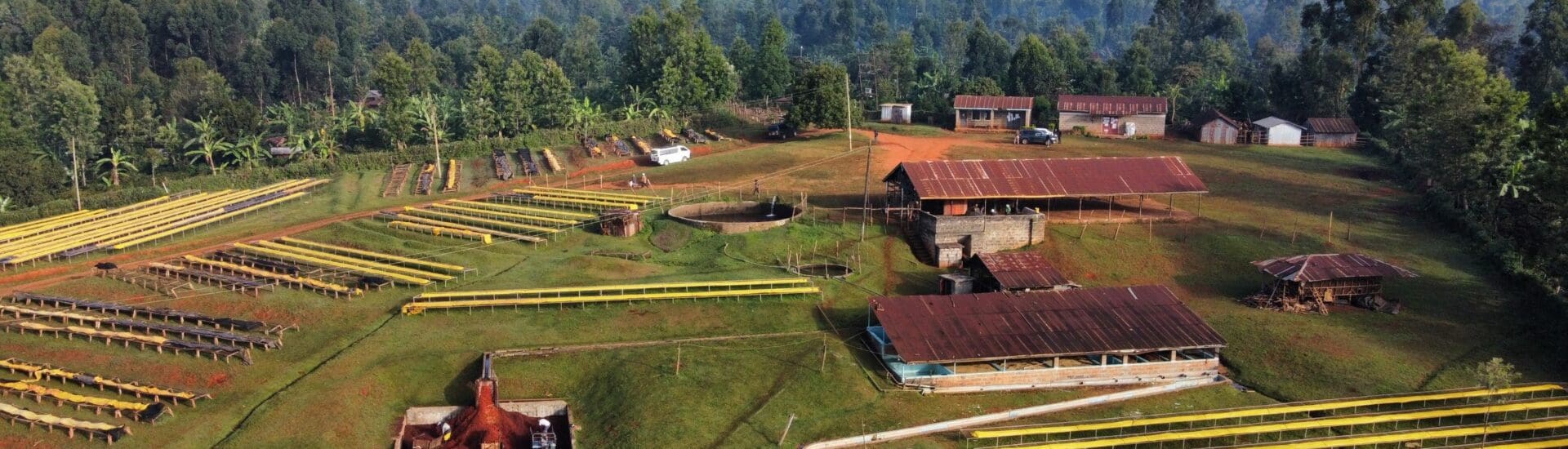 Aerial view of factory (washing station) in Kenya with raised drying beds.