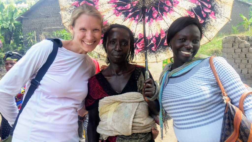 Susan Heller Evenson visiting women coffee producers in Rwanda.