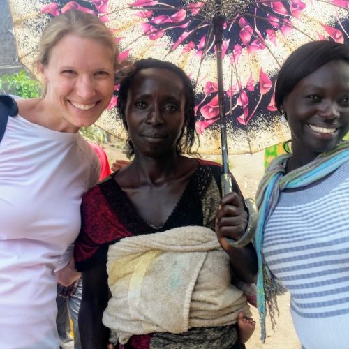 Susan Heller Evenson visiting women coffee producers in Rwanda.